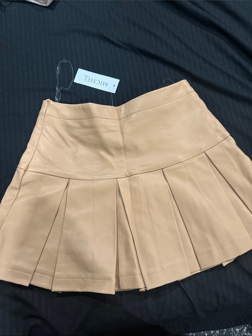 Michele Pleated Faux Leather Mini Skirt in Beige